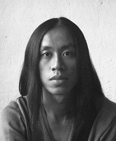 张明归
