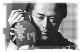 津川雅彦