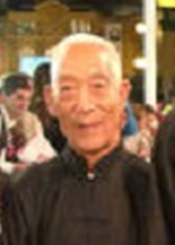 梁存英