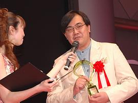 福田己津央