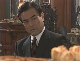 辻万长