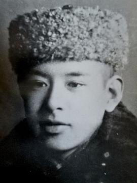 李默然