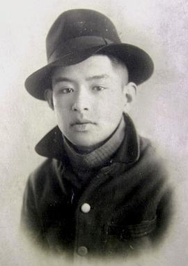 李默然