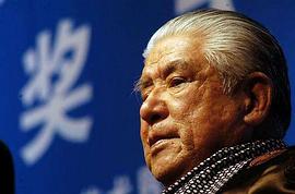 李默然