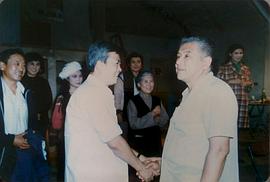 李默然