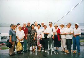 李默然