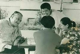 李默然
