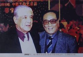 李默然